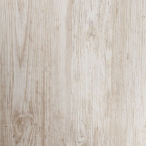 Whitewashed wood paneling with vertical grain lines, material closeup