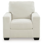 Upholstered armchair with striped fabric, cushioned seat, rolled back, and dark block legs.