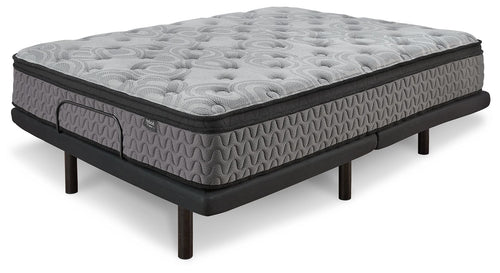 Gray quilted firm mattress with black sides and support legs