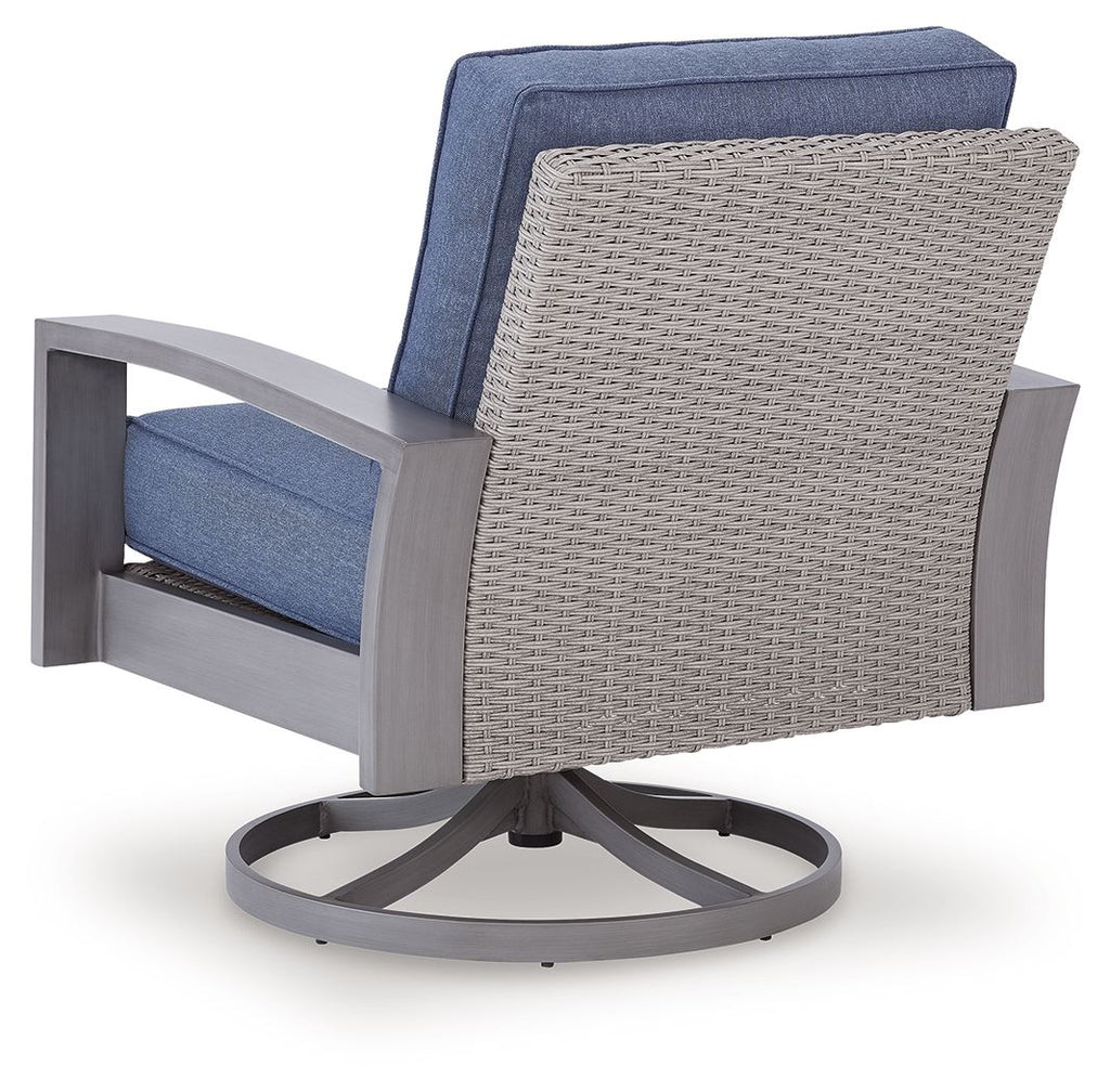 Blue cushioned swivel lounge chair with woven sides and gray frame, round rotating base