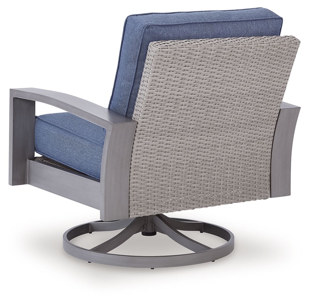 Blue cushioned swivel lounge chair with woven sides and gray frame, round rotating base