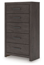 Charcoal five-drawer chest with drawer pulls on stacked drawers.