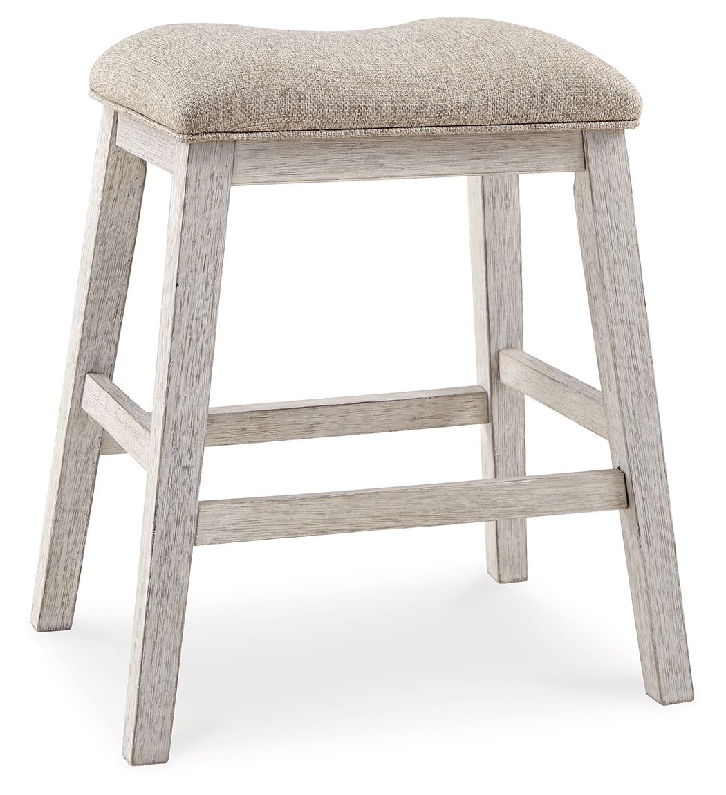 Upholstered vanity stool with beige padded seat and light wood sides, lower footrest
