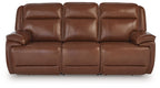 Dark brown leather power reclining sofa with three seat panels and padded armrests