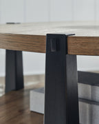 Close-up of dark leg corner with a fixed brace on a round two-tier table.