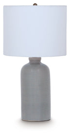 Gray blue ceramic table lamp with ribbed column base and white fabric drum shade