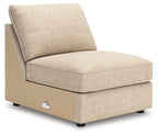 Upholstered armless chair in sand/beige fabric with boxy seat and back cushion