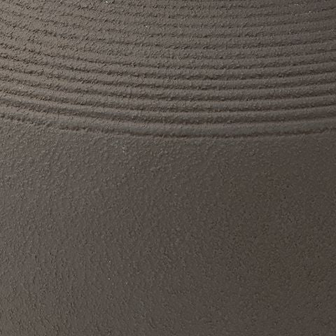 Dalsen vase surface close-up: dark brown stoneware texture with fine horizontal lines.