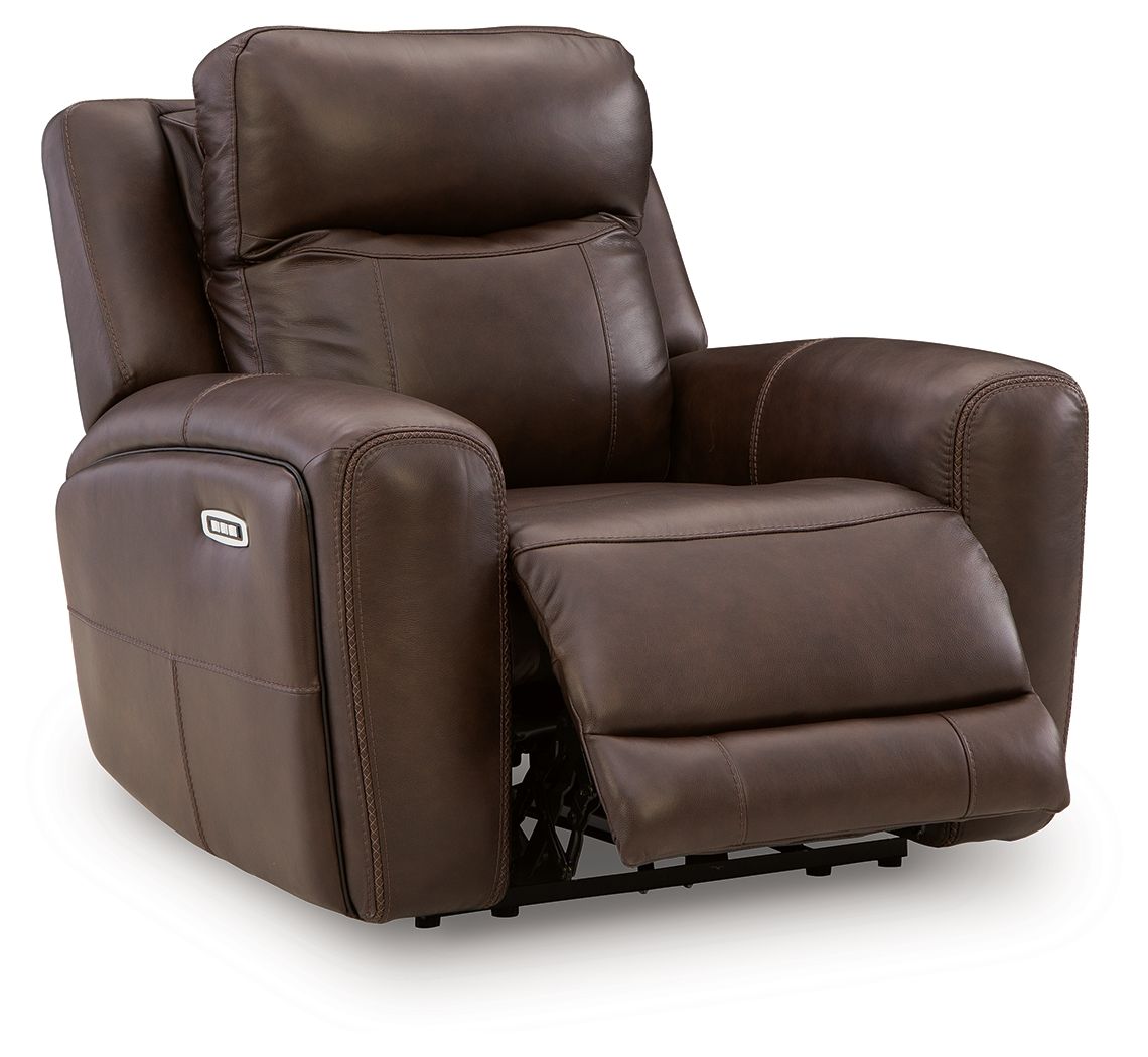 Brown power recliner showing footrest extension and side control panel