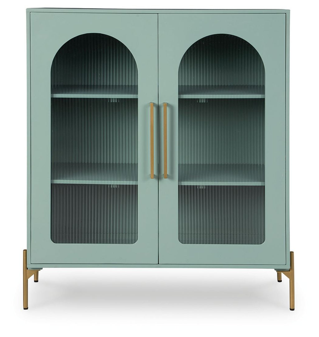 Light green accent cabinet with two arched glass doors and gold vertical handles
