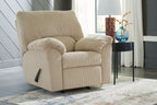 Rocker recliner chair in beige corduroy with padded arms and footrest