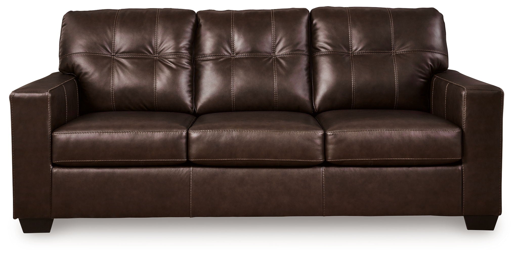 Dark brown leather sofa with tufted back and three cushioned seat sections