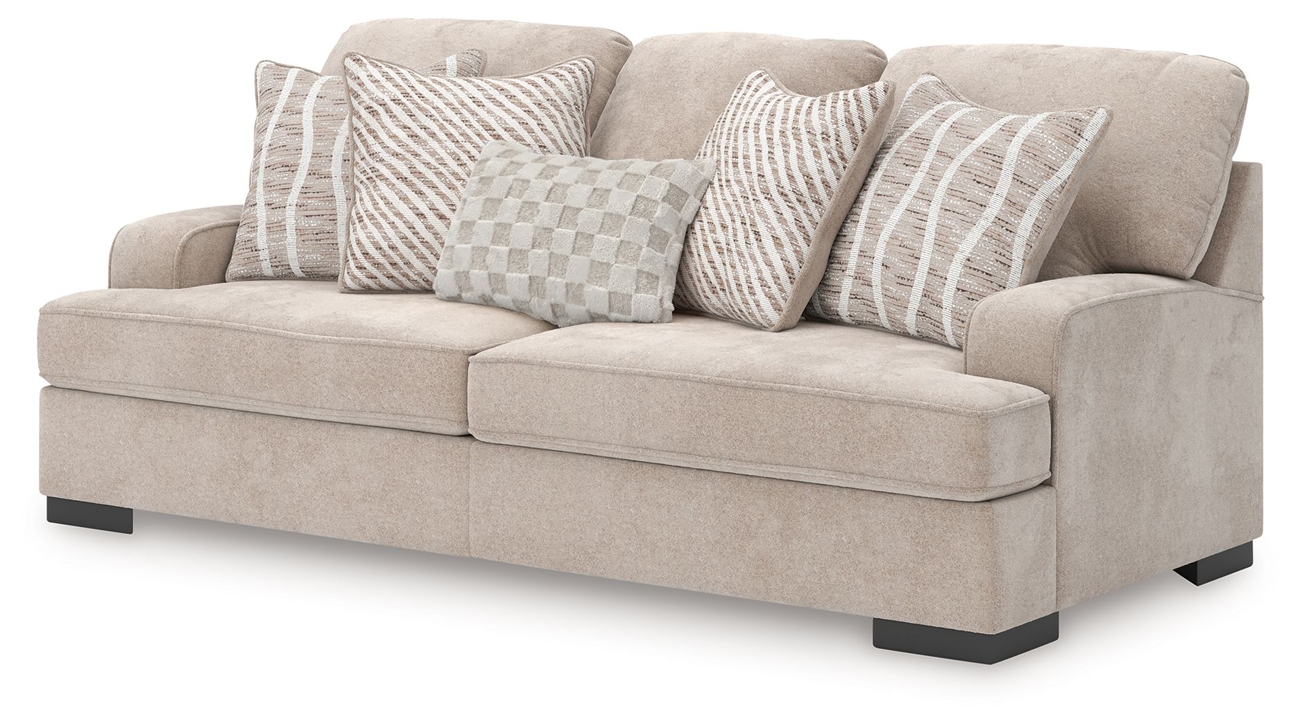 Taupe upholstered sofa with four decorative pillows, including striped and checkered covers