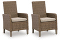 Set of 2 beige woven armchairs with square seat cushions and armrests