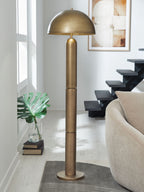 Brass metal floor lamp with domed shade and tall slender base