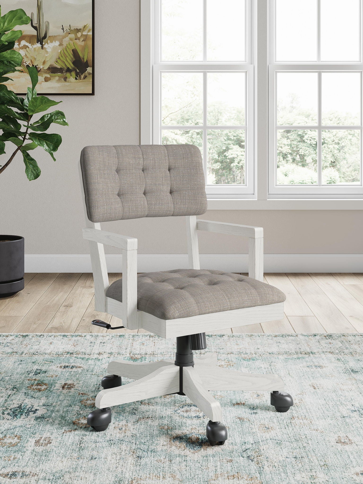 Tufted fabric desk chair with light wood frame, swivel base, and rolling casters