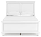 White panel bed headboard and front panel view with two cushions resting on top.
