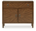 Medium brown accent cabinet with two doors, one drawer, and arched metal knob pulls