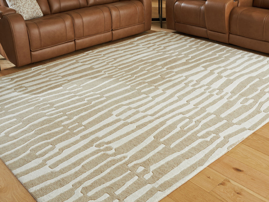 Corrbell beige rug with wide abstract stripe pattern across flat surface.