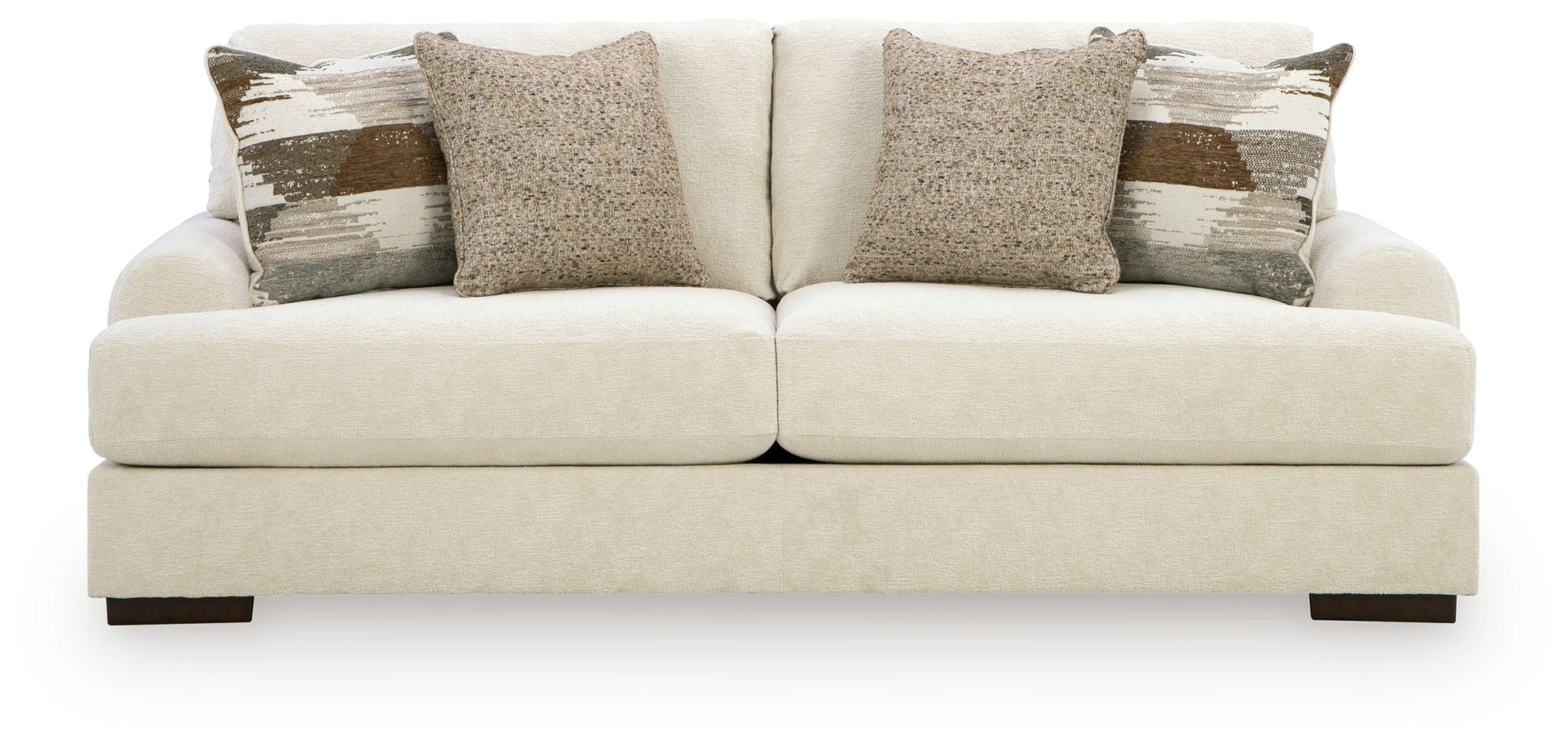 Light beige fabric sofa with three seat cushions and decorative back pillows