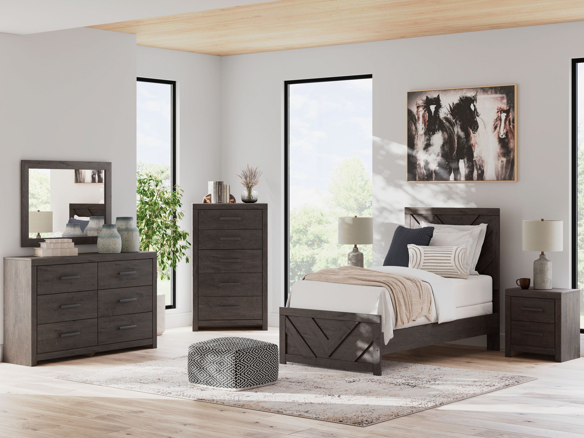 Dark gray panel bedroom set with platform bed, dresser, mirror, and nightstand