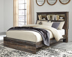 Panel bookcase bed with headboard shelves, dark wood finish, white and gray bedding
