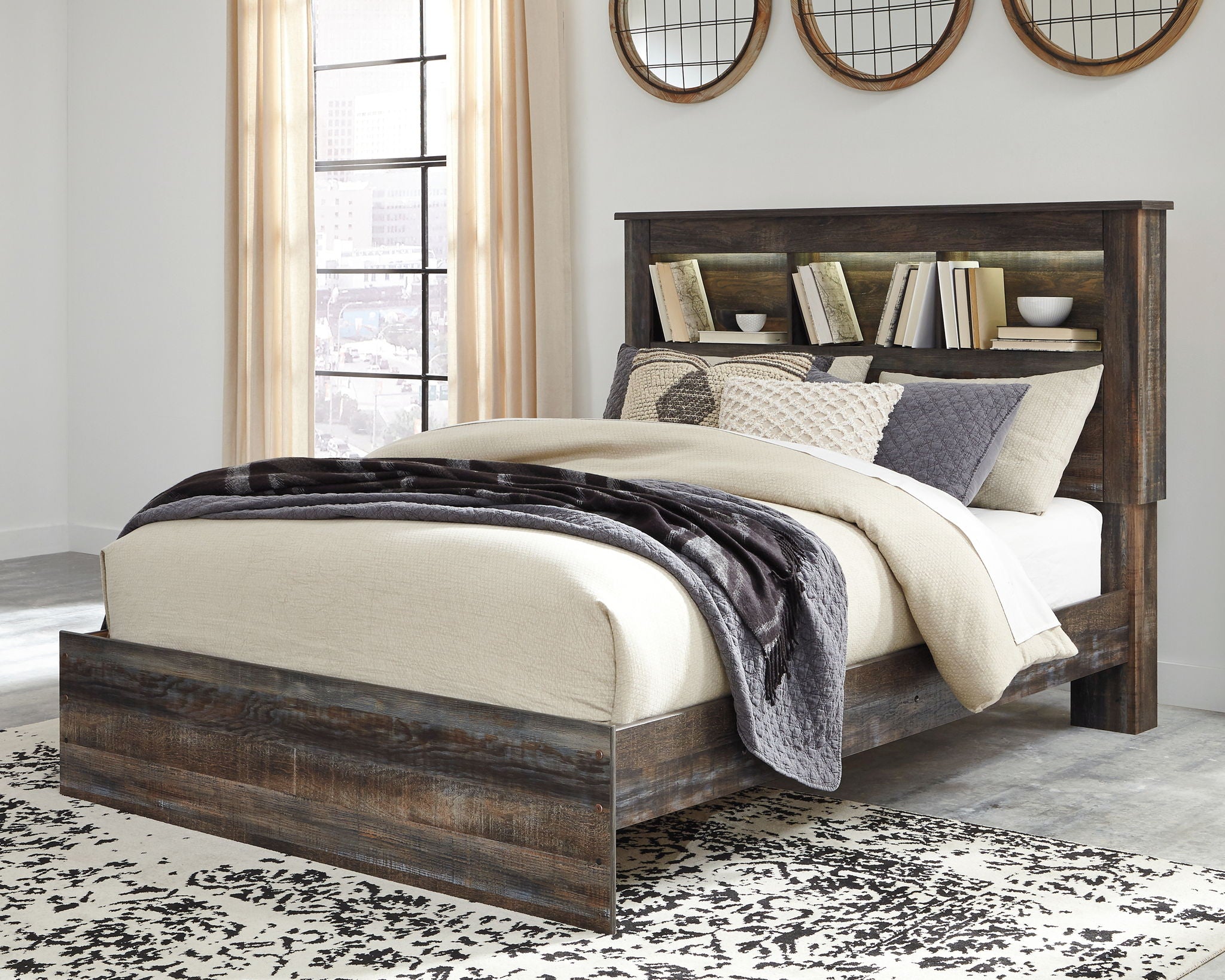 Panel bookcase bed with headboard shelves, dark wood finish, white and gray bedding