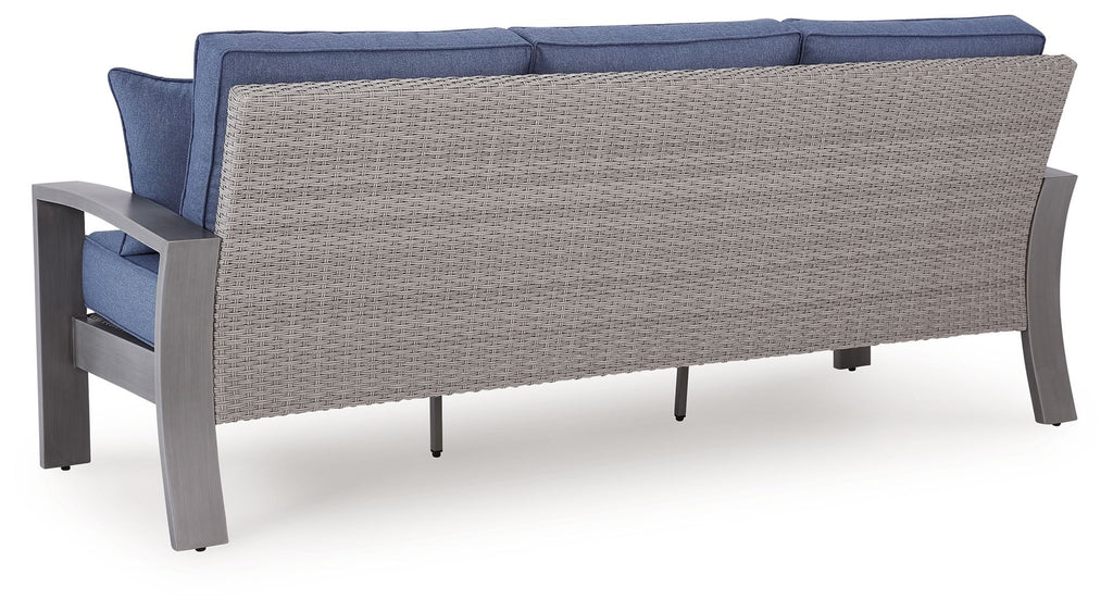 Blue outdoor sofa with gray frame and woven back panel, no front cushions shown