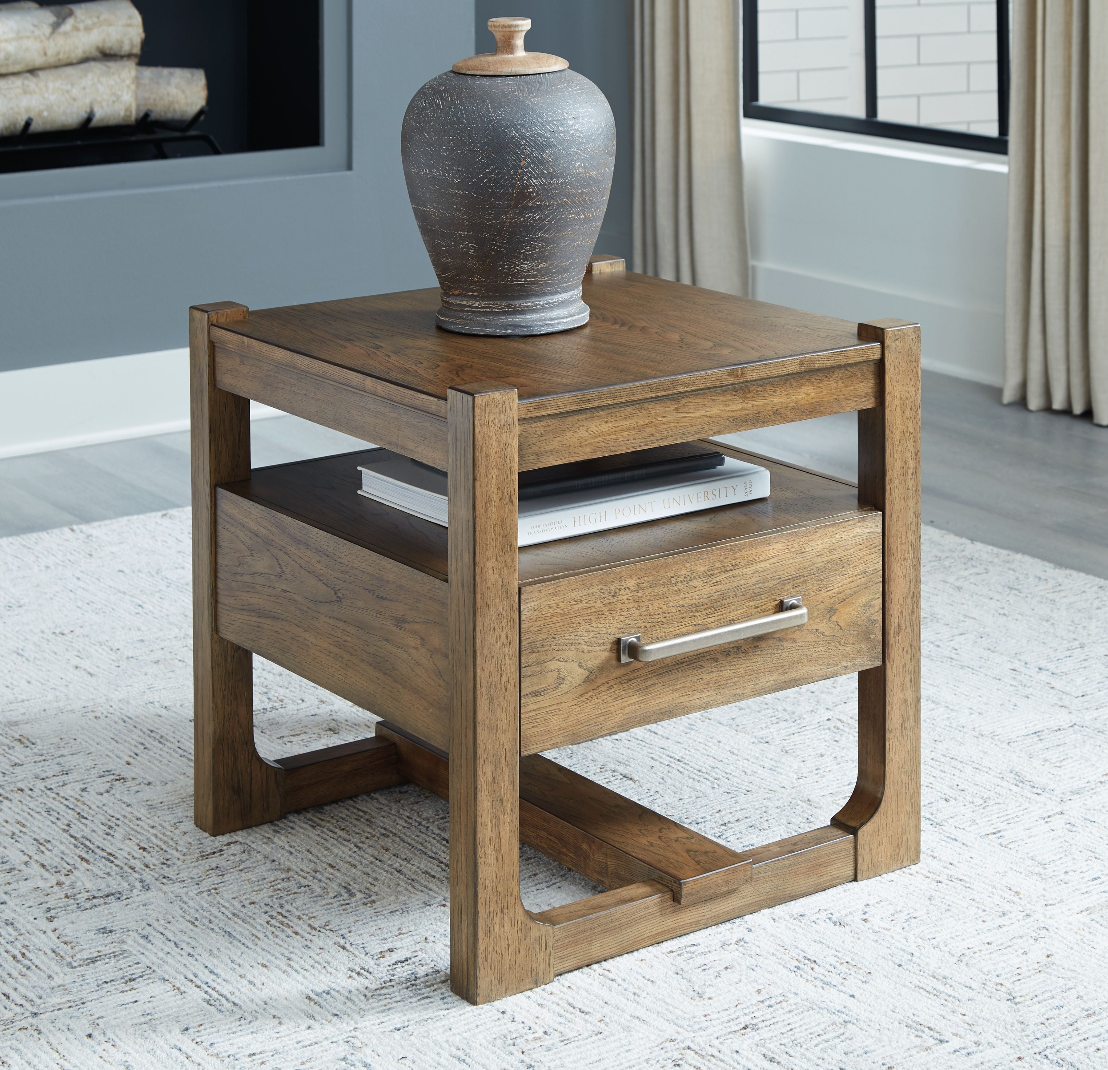 Light brown square end table with front drawer and lower open shelf
