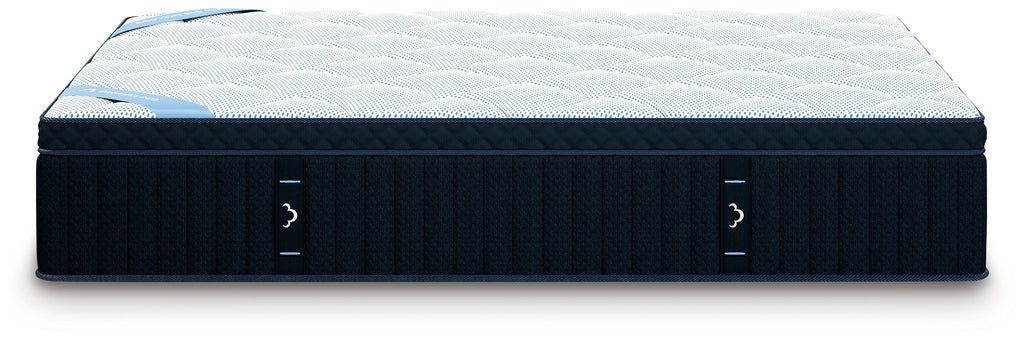 DreamCloud Premier hybrid mattress, dark blue side panels and white quilted top view