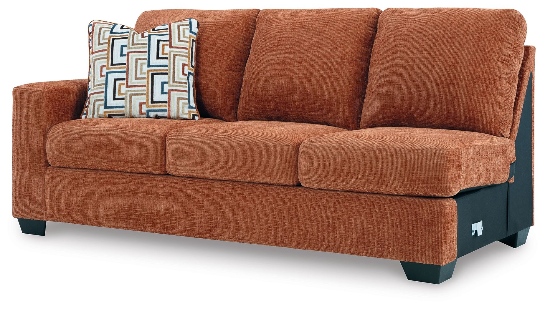 Brown fabric sofa with seat cushions and teal patterned throw pillow