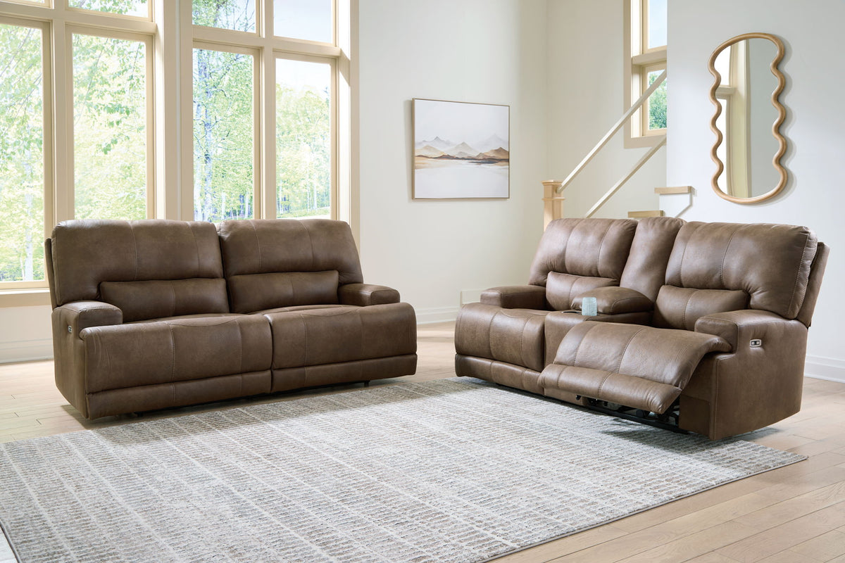 Power reclining loveseat and sofa in dark brown fabric with cushioned arms