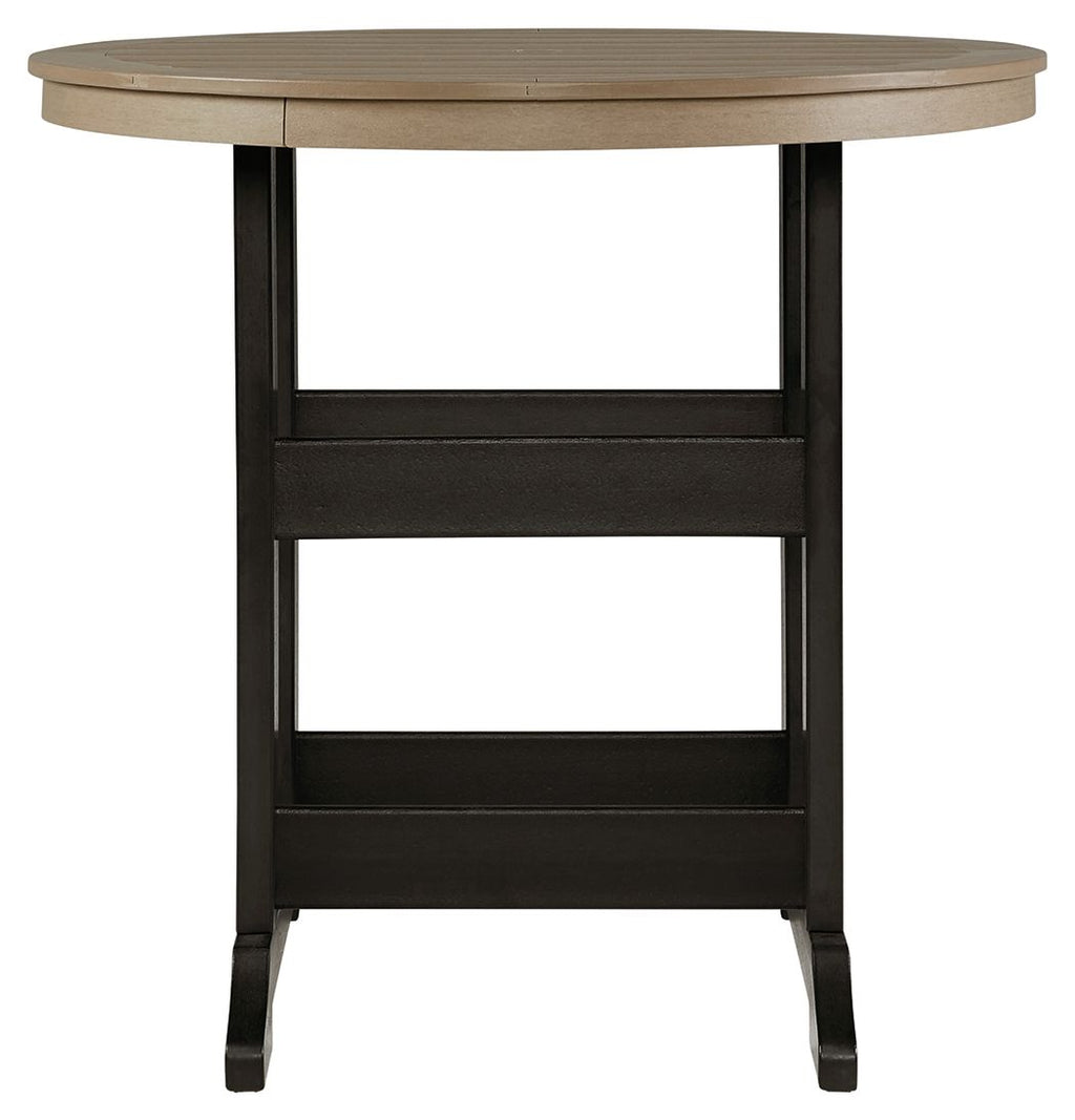Round outdoor dining table with driftwood top and black legged base