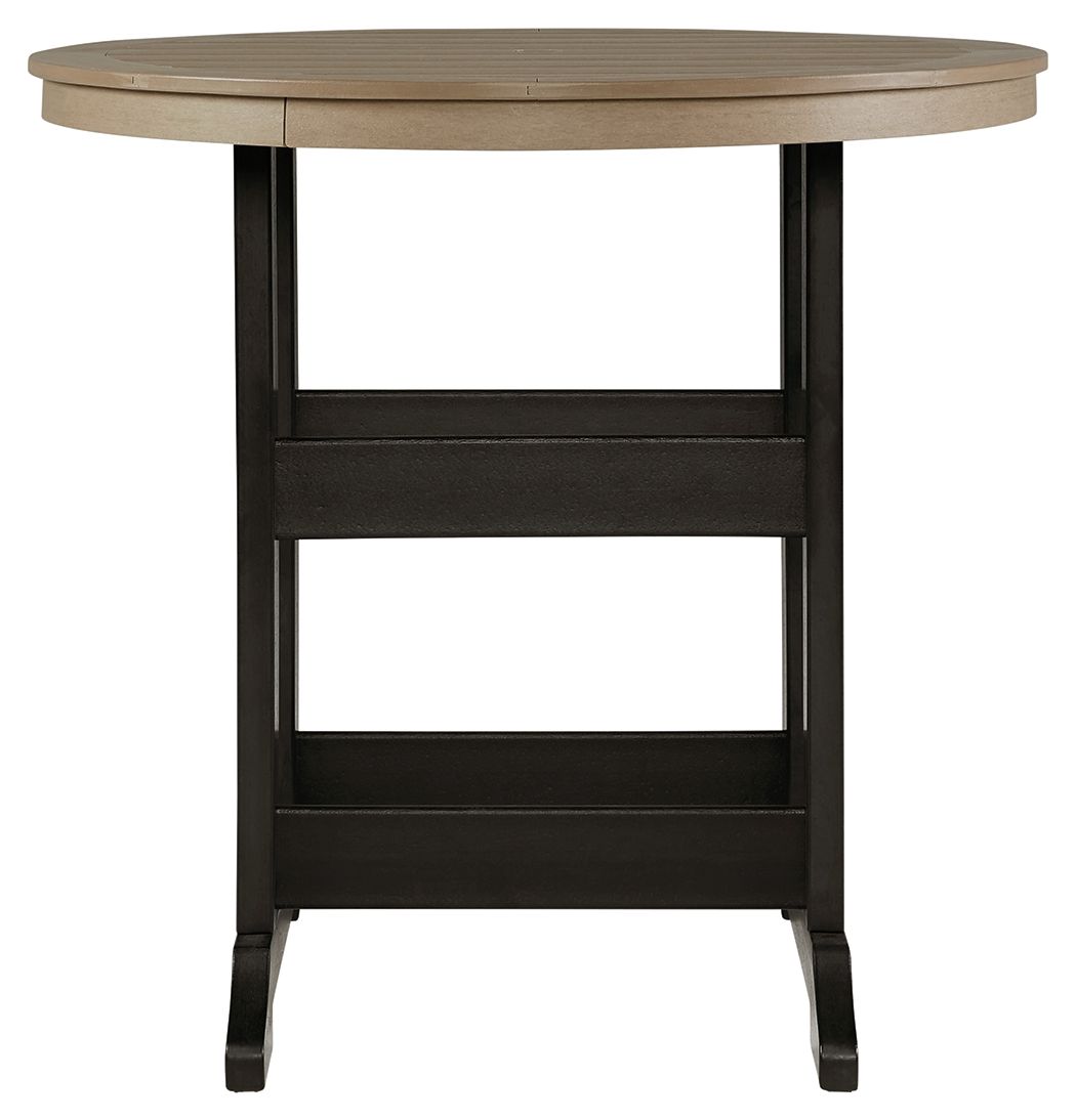 Round outdoor dining table with driftwood top and black legged base