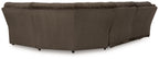 Chocolate brown sectional sofa corner with smooth base and dark seat trim