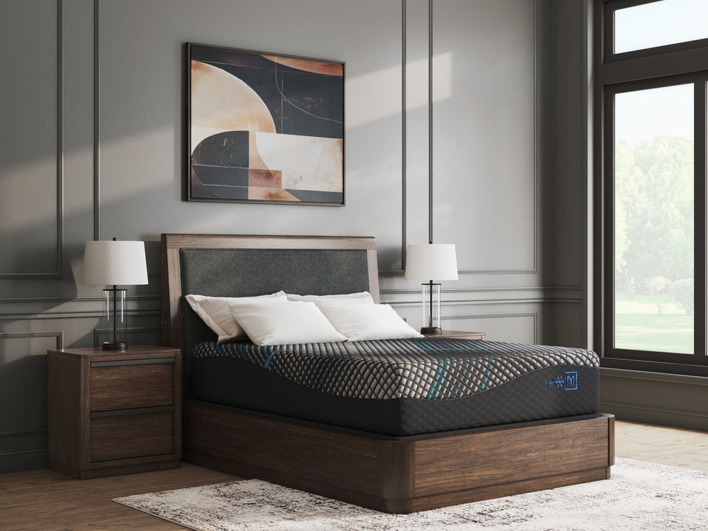 14-inch foam mattress on bed with white pillows; grey top with teal grid lines