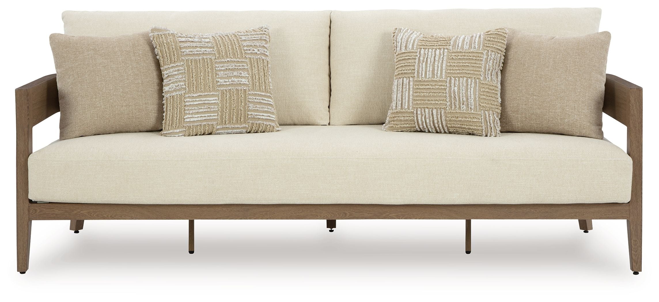 Beige sofa with two patterned square cushions and dark brown wooden legs