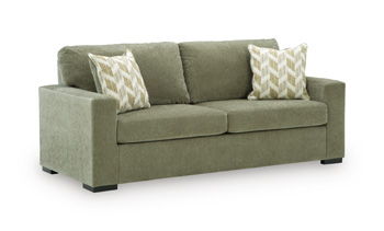 Bridgepoint olive green sofa with two back cushions and two patterned throw pillows