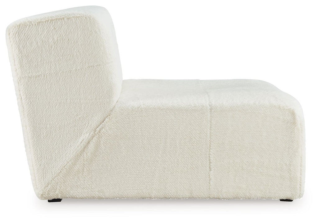 Ivory accent chair with textured fabric, curved back panel, and padded armrests