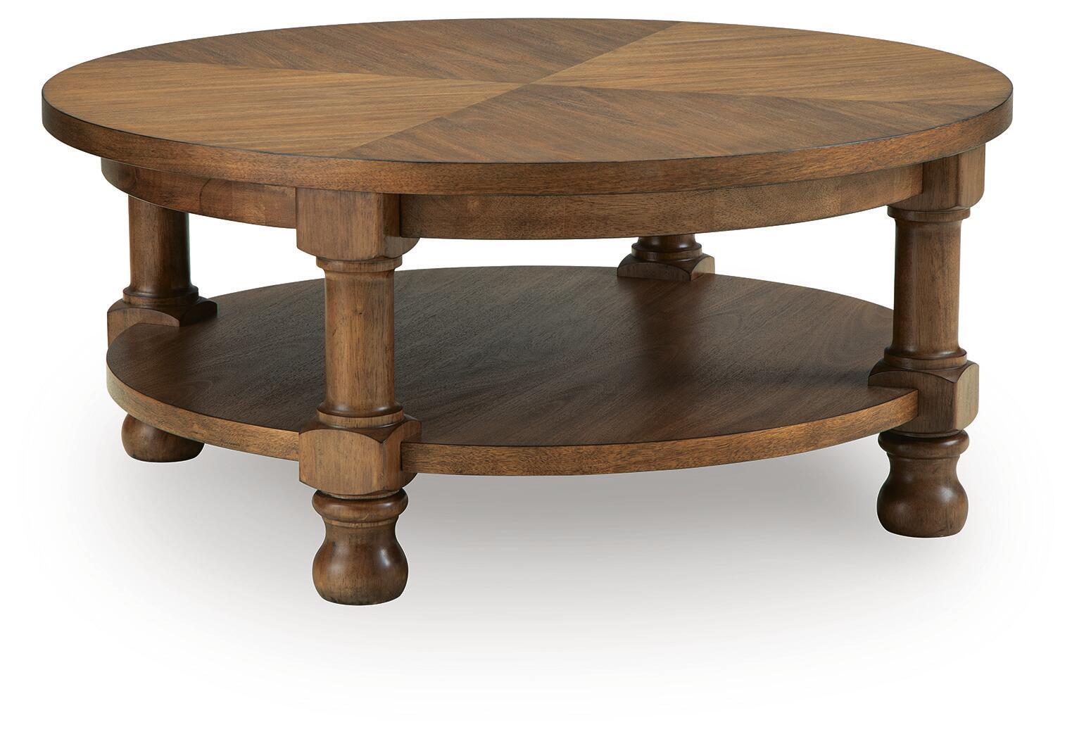Round light brown wooden table with curved lower shelf and turned pedestal legs
