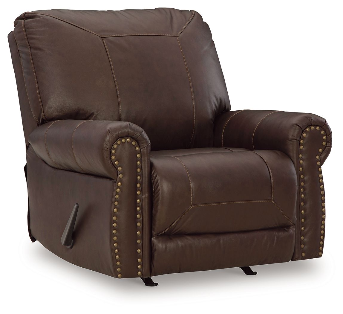 Dark brown leather-look rocker recliner with studded armrests and padded headrest