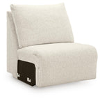 Beige armless chair with square back, boxy seat, and upholstered fabric