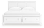White panel bed with two front drawers and two upholstered pillows on the headboard