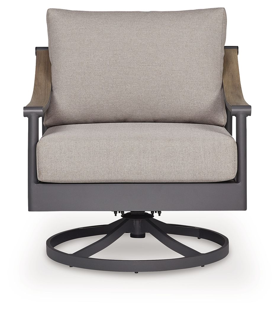 Gray swivel lounge chair with cushion, upright back, round swivel base