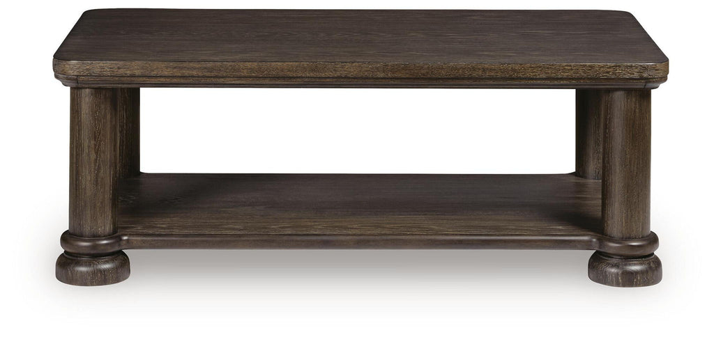 Dark brown rectangular table with flat top and lower shelf, supported by turned legs