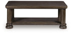 Dark brown rectangular table with flat top and lower shelf, supported by turned legs