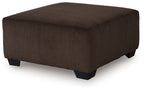 Oversized accent ottoman, chocolate-brown fabric with ribbed texture and dark legs
