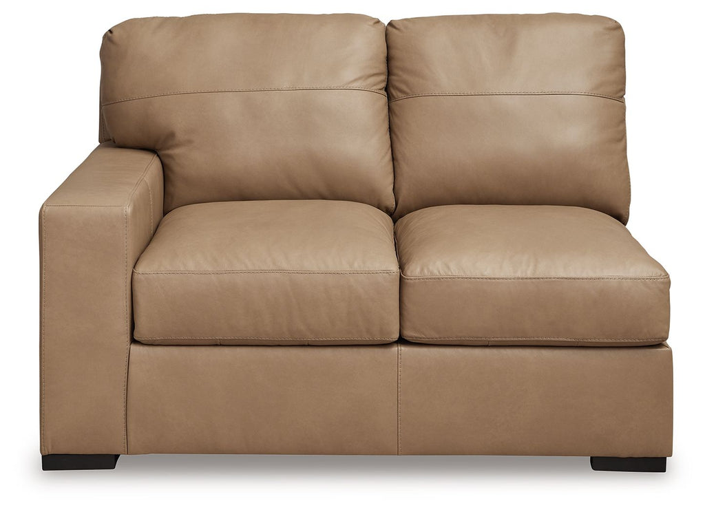 Toffee two-seat loveseat with boxy arms, split back cushions, and padded base