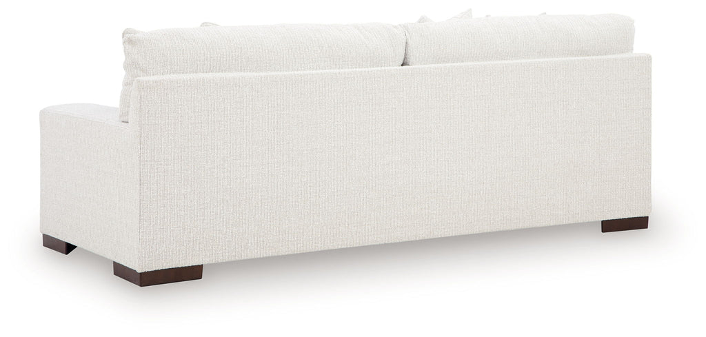 Hartside sofa back view with off-white fabric upholstery and dark wooden legs