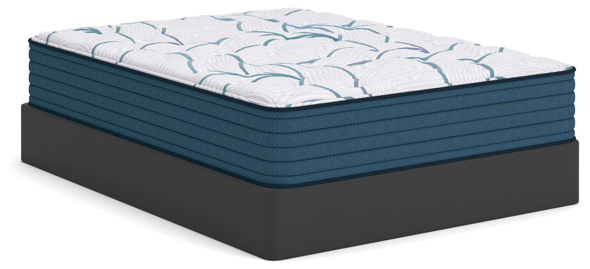 Plush mattress with white top and light blue pattern, dark blue sides on black base